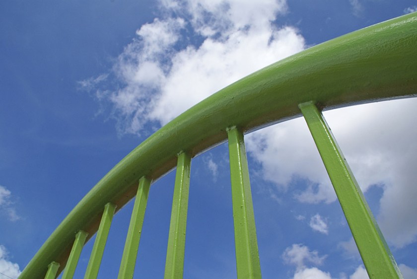 Green Fence and Blue Sky